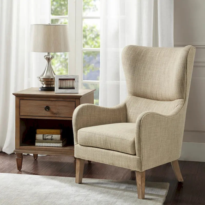 Poltrona Swoop Mid-Century Modern con schienale ad ali in tessuto grigio e gambe in legno massello